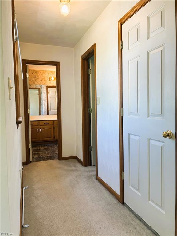 937 Marble Arch, Chesapeake, VA 23322 - hall with baseboards and light carpet
