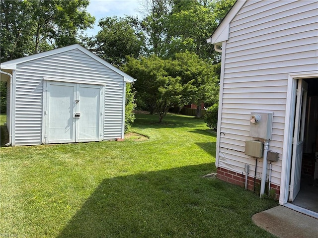 937 Marble Arch, Chesapeake, VA 23322 - view of green lawn with a shed