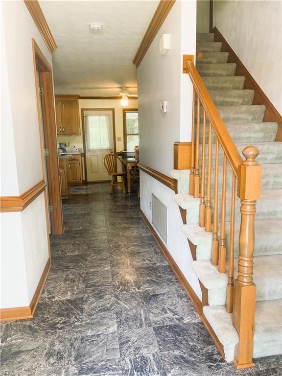 937 Marble Arch, Chesapeake, VA 23322 - stairway featuring crown molding