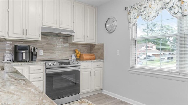 969 Sunnyside Dr, Virginia Beach, VA 23464 - kitchen featuring stainless steel electric range oven, under cabinet range hood, white cabinetry, and decorative backsplash