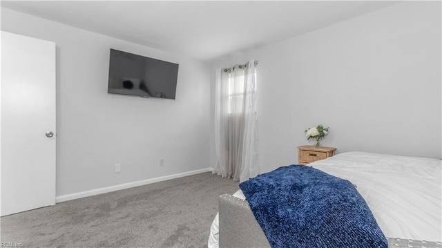 969 Sunnyside Dr, Virginia Beach, VA 23464 - carpeted bedroom with baseboards