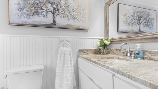 969 Sunnyside Dr, Virginia Beach, VA 23464 - half bath featuring a wainscoted wall and vanity