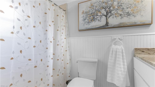 969 Sunnyside Dr, Virginia Beach, VA 23464 - bathroom with wainscoting, vanity, and a shower with shower curtain