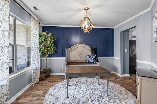 1205 Woods Way, Chesapeake, VA 23323 - home office featuring dark wood finished floors, a chandelier, a textured ceiling, and ornamental molding