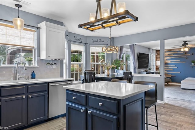 1205 Woods Way, Chesapeake, VA 23323 - kitchen with a chandelier, dishwasher, open floor plan, and light countertops