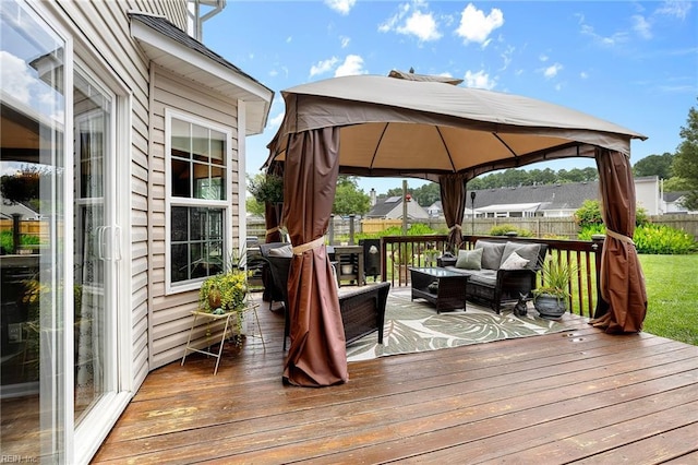 1205 Woods Way, Chesapeake, VA 23323 - deck with outdoor lounge area, a gazebo, and a fenced backyard