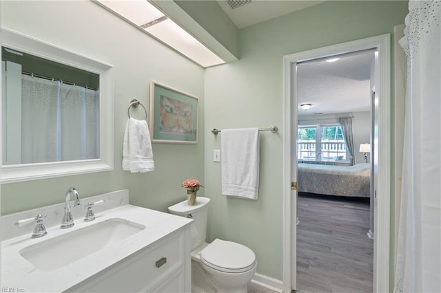 1013 Winged Foot Ct Unit A, Chesapeake, VA 23320 - ensuite bathroom featuring vanity and wood finished floors