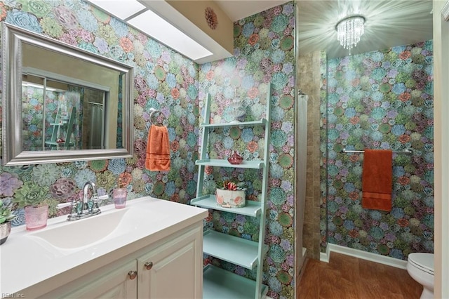 1013 Winged Foot Ct Unit A, Chesapeake, VA 23320 - bathroom featuring wallpapered walls, wood finished floors, vanity, and a shower stall