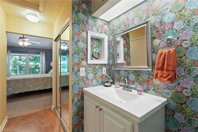 1013 Winged Foot Ct Unit A, Chesapeake, VA 23320 - bathroom featuring ensuite bathroom, wood finished floors, vanity, wallpapered walls, and ceiling fan