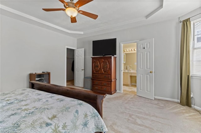 2000 Kelsey Bay Ct, Chesapeake, VA 23323 - bedroom featuring light colored carpet, a tray ceiling, ceiling fan, and connected bathroom
