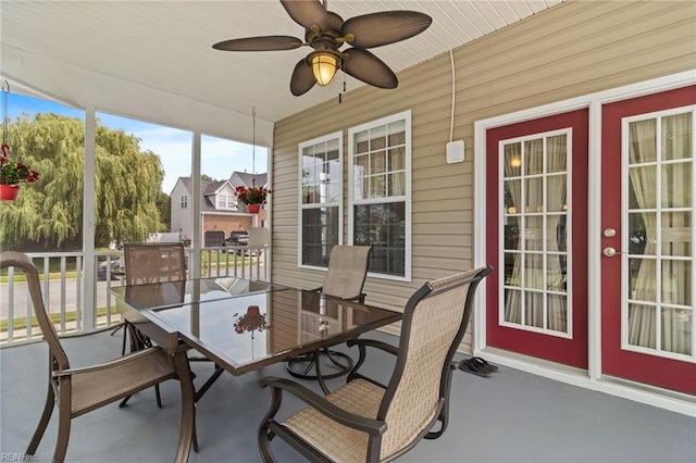 2000 Kelsey Bay Ct, Chesapeake, VA 23323 - sunroom featuring outdoor dining area, a ceiling fan, and wooden walls