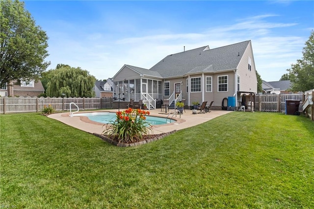 2000 Kelsey Bay Ct, Chesapeake, VA 23323 - back of property featuring a sunroom, a fenced backyard, and a patio area