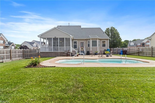 2000 Kelsey Bay Ct, Chesapeake, VA 23323 - back of property with a sunroom, a fenced backyard, and a patio