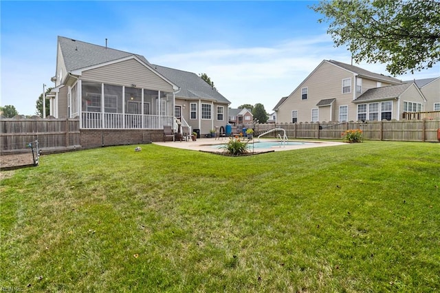 2000 Kelsey Bay Ct, Chesapeake, VA 23323 - rear view of property featuring a sunroom, a fenced backyard, and a patio area