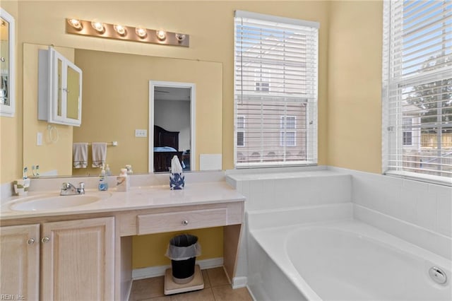 2000 Kelsey Bay Ct, Chesapeake, VA 23323 - full bathroom with connected bathroom, a garden tub, healthy amount of natural light, and vanity