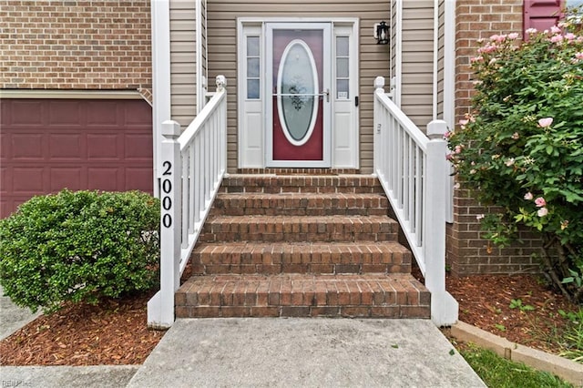 2000 Kelsey Bay Ct, Chesapeake, VA 23323 - doorway to property with brick siding and an attached garage