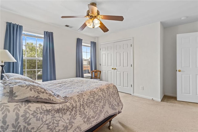2000 Kelsey Bay Ct, Chesapeake, VA 23323 - bedroom featuring multiple windows, carpet floors, a closet, and ceiling fan
