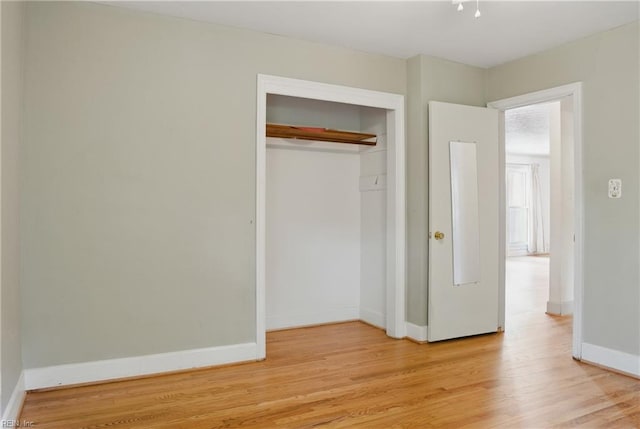 512 Rock Dr, Chesapeake, VA 23323 - unfurnished bedroom with light wood-style flooring and a closet