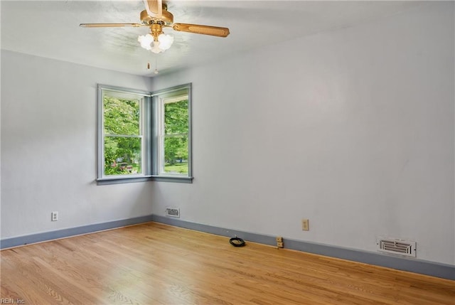 512 Rock Dr, Chesapeake, VA 23323 - spare room featuring wood finished floors and a ceiling fan