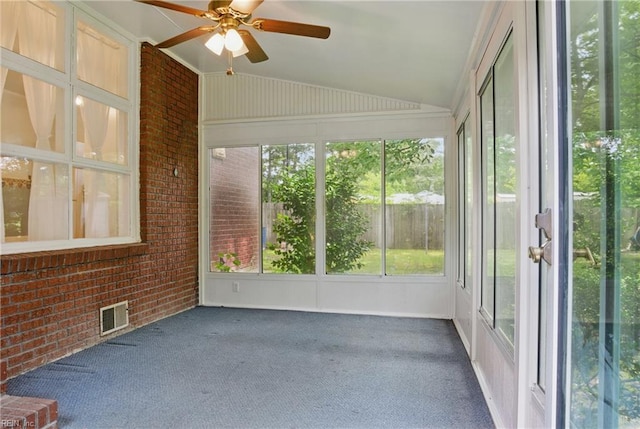 512 Rock Dr, Chesapeake, VA 23323 - unfurnished sunroom featuring brick wall, vaulted ceiling, and carpet floors