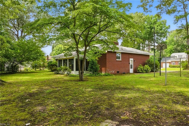 512 Rock Dr, Chesapeake, VA 23323 - view of grassy yard with a sunroom