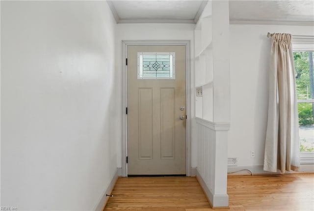 512 Rock Dr, Chesapeake, VA 23323 - entryway featuring light wood-type flooring and crown molding