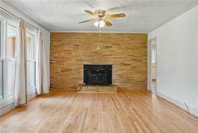 512 Rock Dr, Chesapeake, VA 23323 - unfurnished living room featuring a ceiling fan, wood finished floors, and crown molding