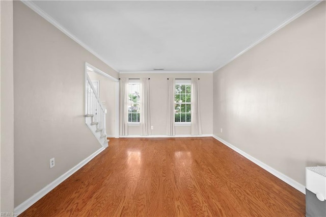2505 Castle Hill Ct, Virginia Beach, VA 23454 - unfurnished room with wood finished floors, stairs, and ornamental molding