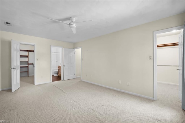 2505 Castle Hill Ct, Virginia Beach, VA 23454 - unfurnished bedroom featuring a walk in closet, a closet, carpet, and ensuite bath