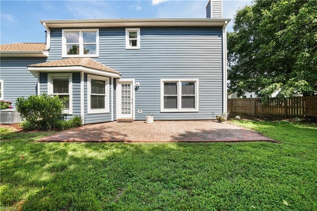 2505 Castle Hill Ct, Virginia Beach, VA 23454 - back of property with a chimney and a patio area