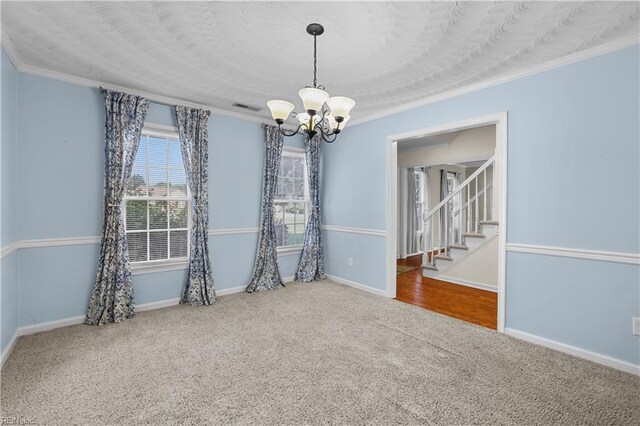 2505 Castle Hill Ct, Virginia Beach, VA 23454 - carpeted spare room featuring a chandelier, crown molding, and stairs