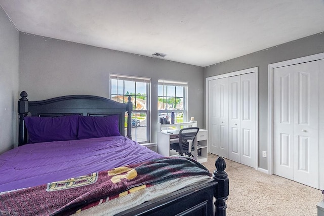 5537 Port Royal Dr, Virginia Beach, VA 23462 - carpeted bedroom featuring multiple closets