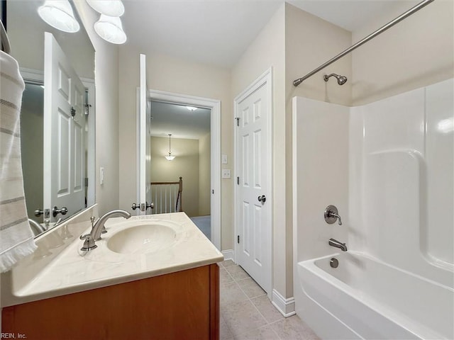 6885 Colemans Crossing Ave, Hayes, VA 23072 - full bathroom with vanity, shower / bath combination, and tile patterned flooring