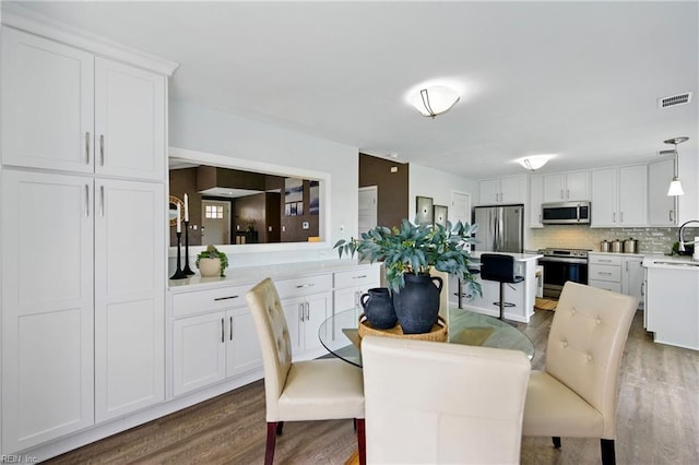 3441 Daisy Cres, Virginia Beach, VA 23453 - dining area with wood finished floors