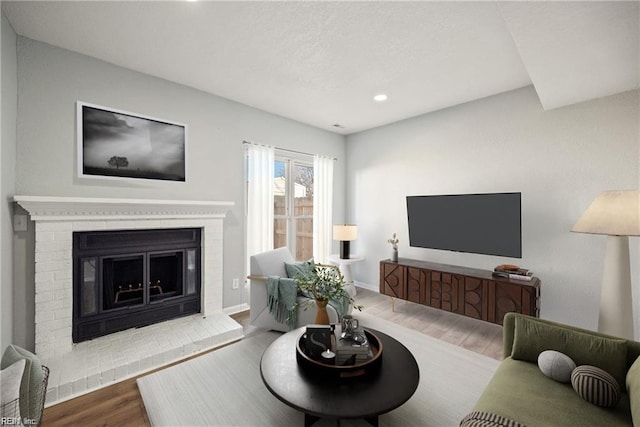 3720 Northwood Ct, Virginia Beach, VA 23452 - living room with wood finished floors, recessed lighting, and a brick fireplace