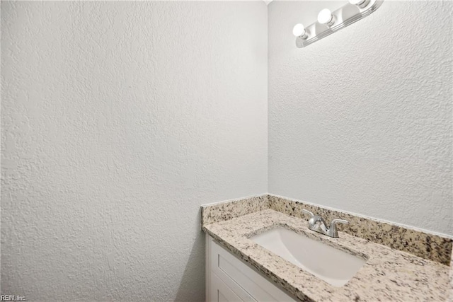 3720 Northwood Ct, Virginia Beach, VA 23452 - bathroom featuring vanity and a textured wall