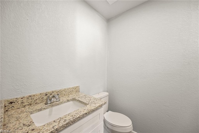 3720 Northwood Ct, Virginia Beach, VA 23452 - half bathroom featuring vanity and a textured wall