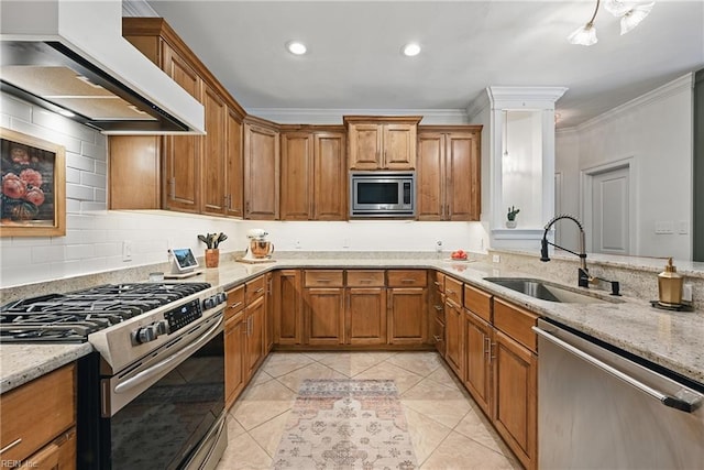 409 Torre Pine Ct, Chesapeake, VA 23322 - kitchen featuring appliances with stainless steel finishes, custom exhaust hood, brown cabinetry, light stone countertops, and recessed lighting