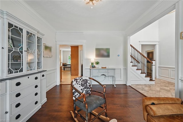 409 Torre Pine Ct, Chesapeake, VA 23322 - sitting room featuring ornamental molding, a decorative wall, dark wood finished floors, stairway, and a wainscoted wall
