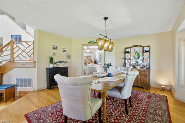 1737 Pleasant Ridge Rd, Virginia Beach, VA 23457 - dining space featuring light wood-type flooring and stairway