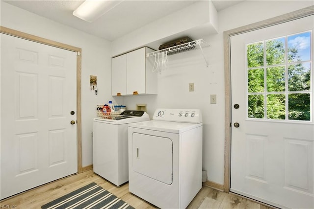 1737 Pleasant Ridge Rd, Virginia Beach, VA 23457 - laundry area with cabinet space, independent washer and dryer, healthy amount of natural light, and light wood-style floors