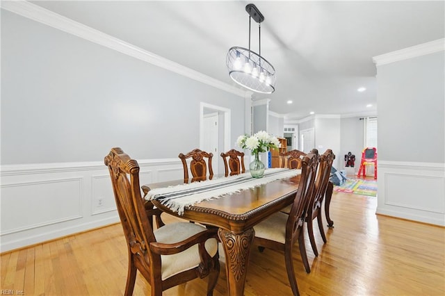 20517 Madison Ct, Smithfield, VA 23430 - dining room featuring ornamental molding, light wood-type flooring, wainscoting, recessed lighting, and a decorative wall