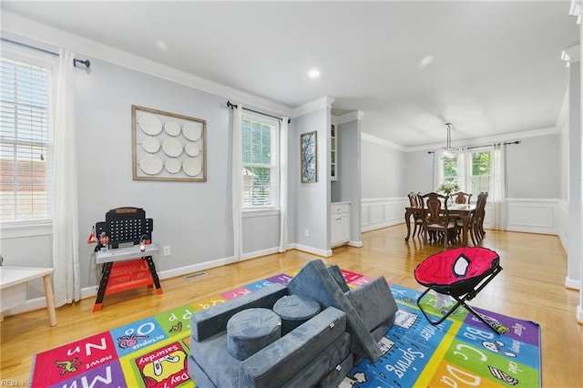 20517 Madison Ct, Smithfield, VA 23430 - playroom with ornamental molding, wood finished floors, and a wainscoted wall