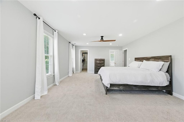20517 Madison Ct, Smithfield, VA 23430 - carpeted bedroom featuring recessed lighting, ceiling fan, and a walk in closet