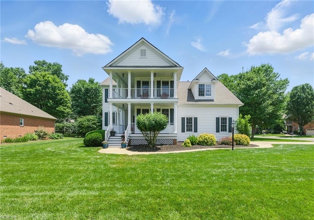 20517 Madison Ct, Smithfield, VA 23430 - view of front of house featuring a balcony, a porch, and a front yard
