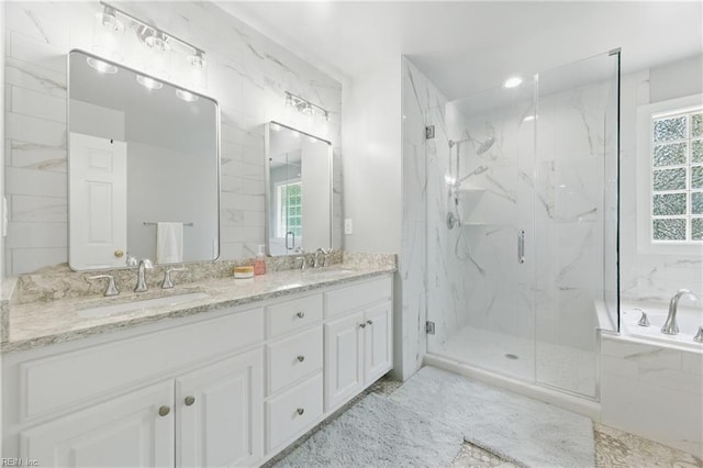 20517 Madison Ct, Smithfield, VA 23430 - bathroom featuring a marble finish shower, double vanity, and a bath