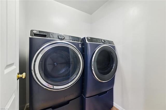 20517 Madison Ct, Smithfield, VA 23430 - laundry room with separate washer and dryer and baseboards
