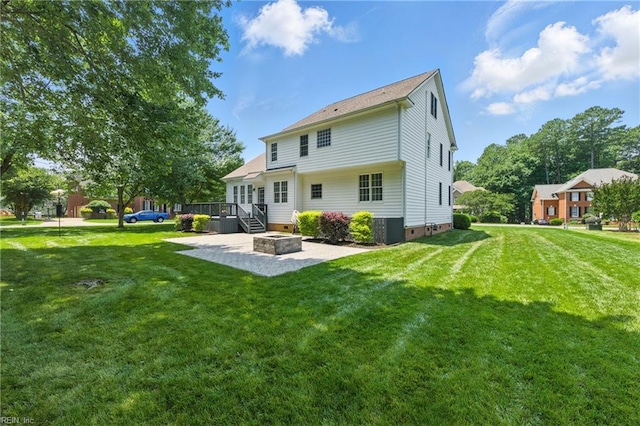 20517 Madison Ct, Smithfield, VA 23430 - back of property featuring a patio area, a lawn, an outdoor fire pit, crawl space, and a deck