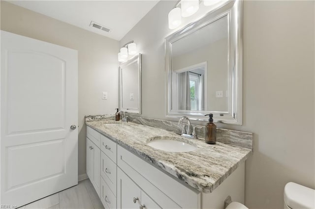 1832 Andrews Blvd, Hampton, VA 23663 - bathroom with toilet and double vanity