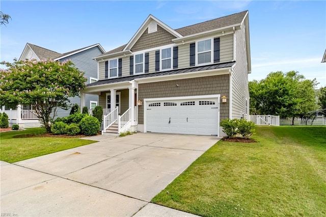 3112 Sybilla St, Chesapeake, VA 23323 - view of front of home with a standing seam roof, an attached garage, driveway, a metal roof, and a porch